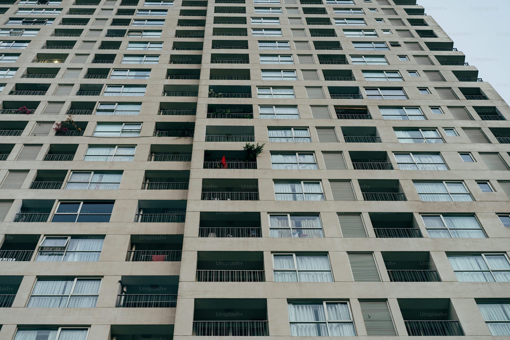 Apartment building exterior with rows of windows — a typical strata building that would be covered in a strata inspection report