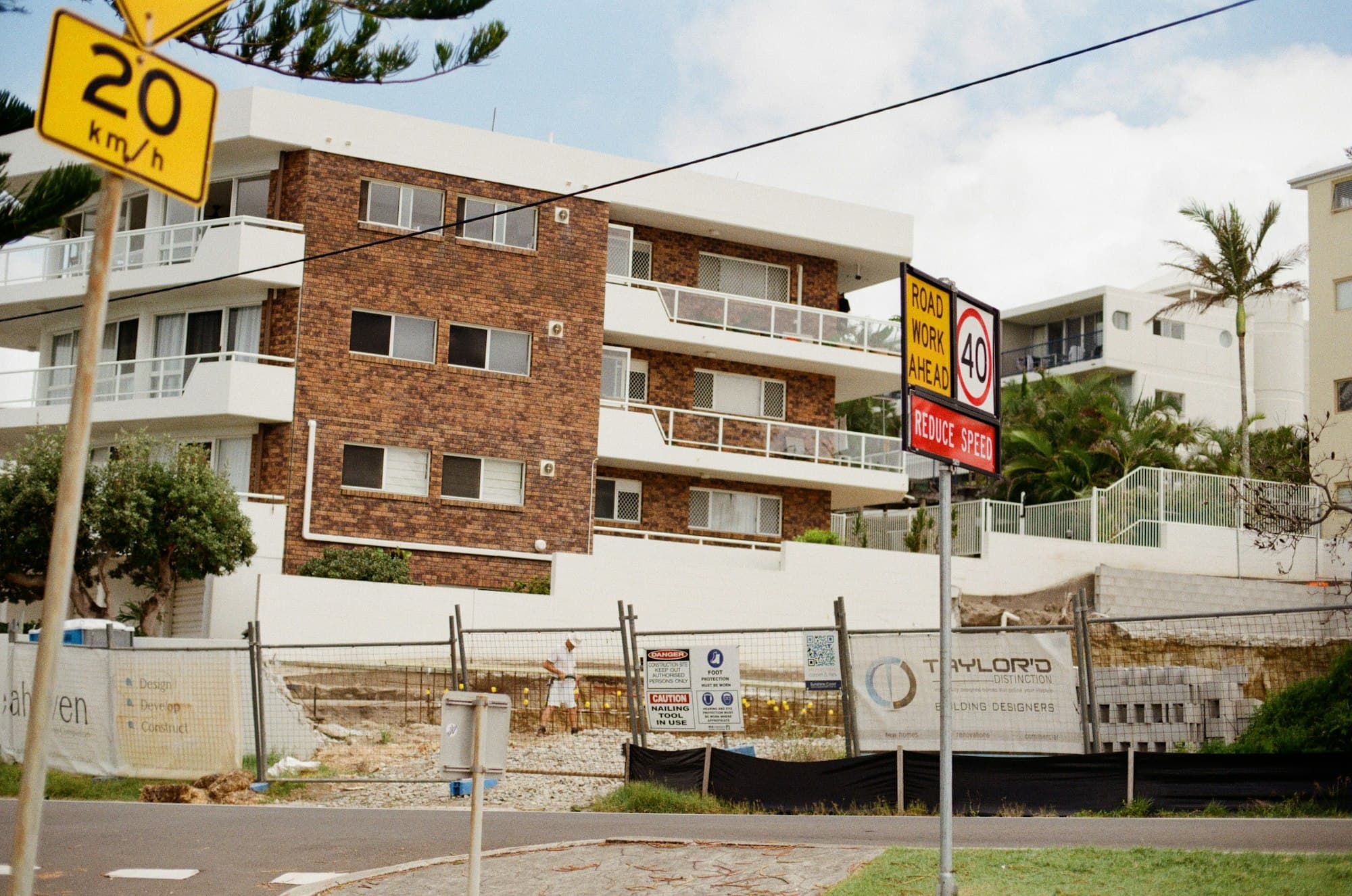 Brown and white concrete apartment building in Brisbane, Australia