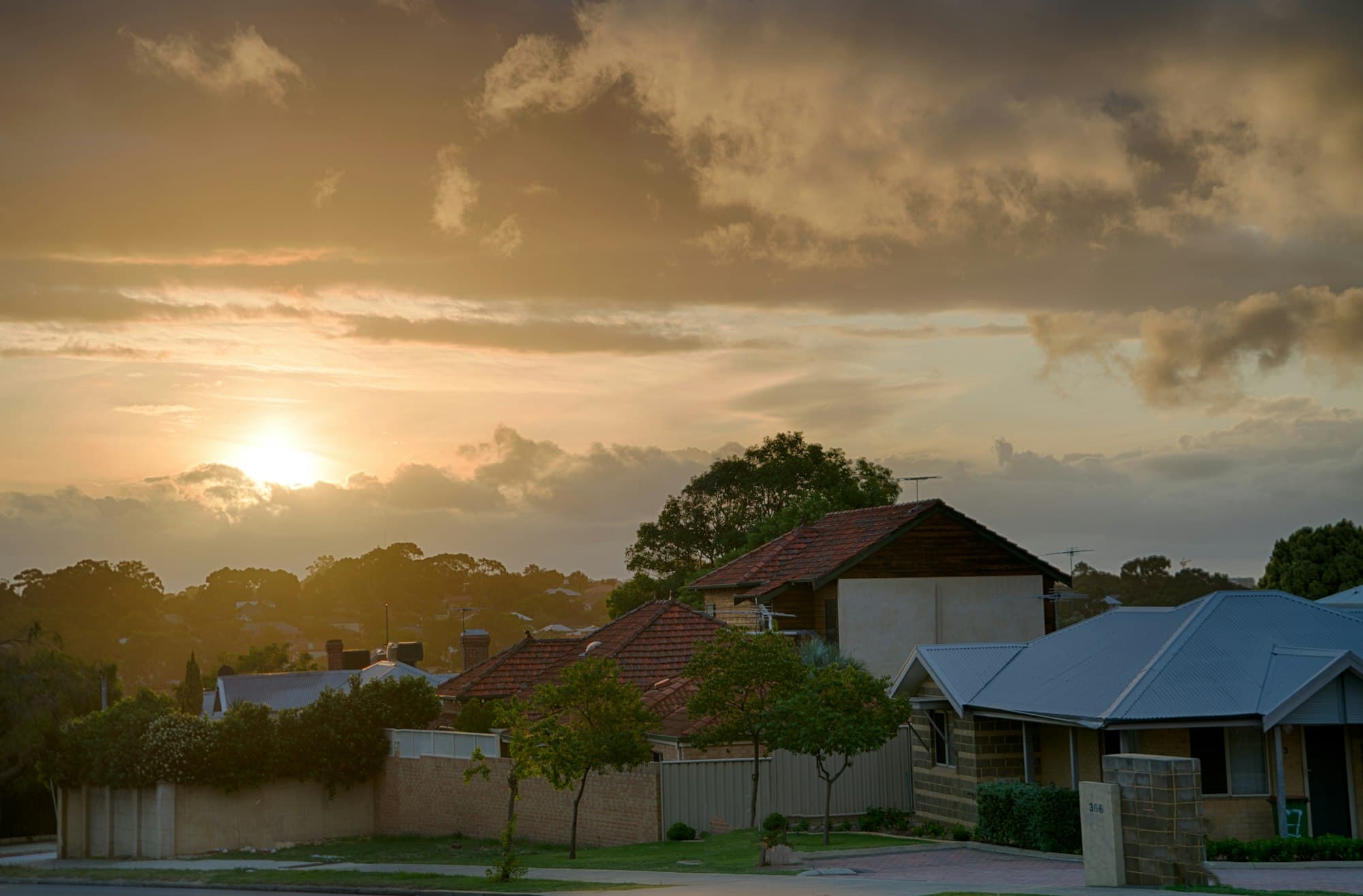 A suburban house in Perth, Australia at sunset — representing torrens title property ownership
